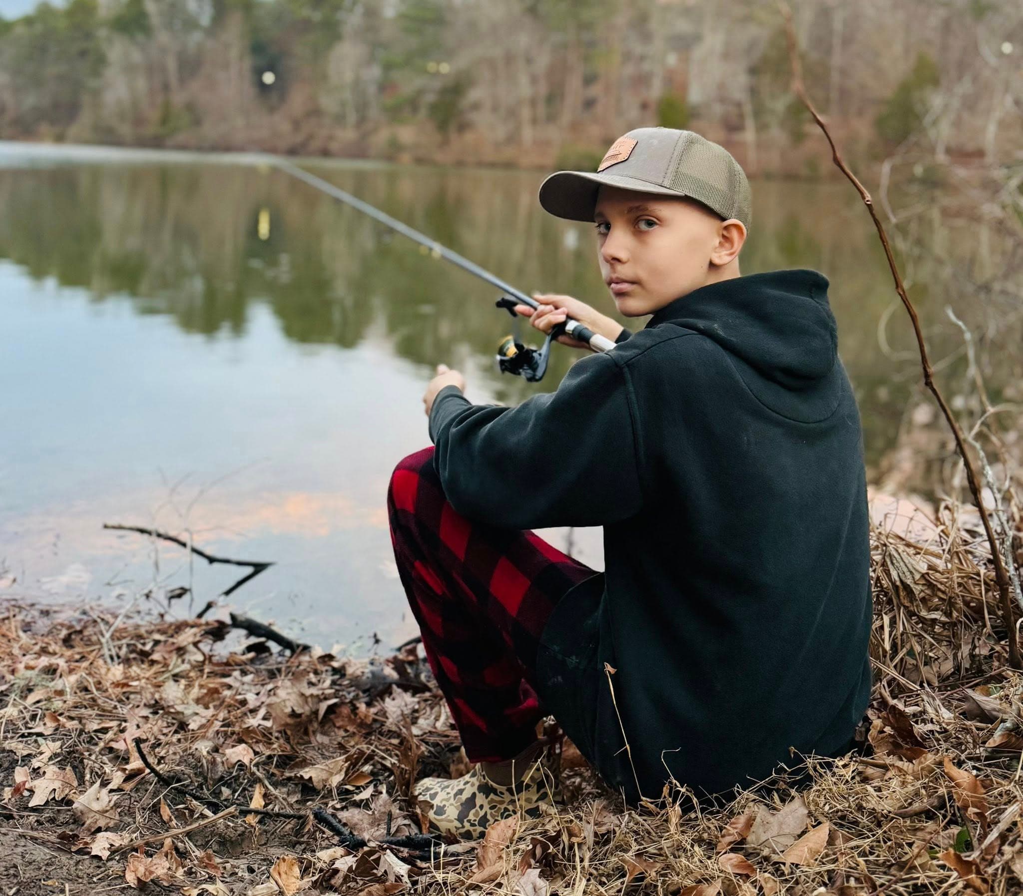 Carter fishing by the lake